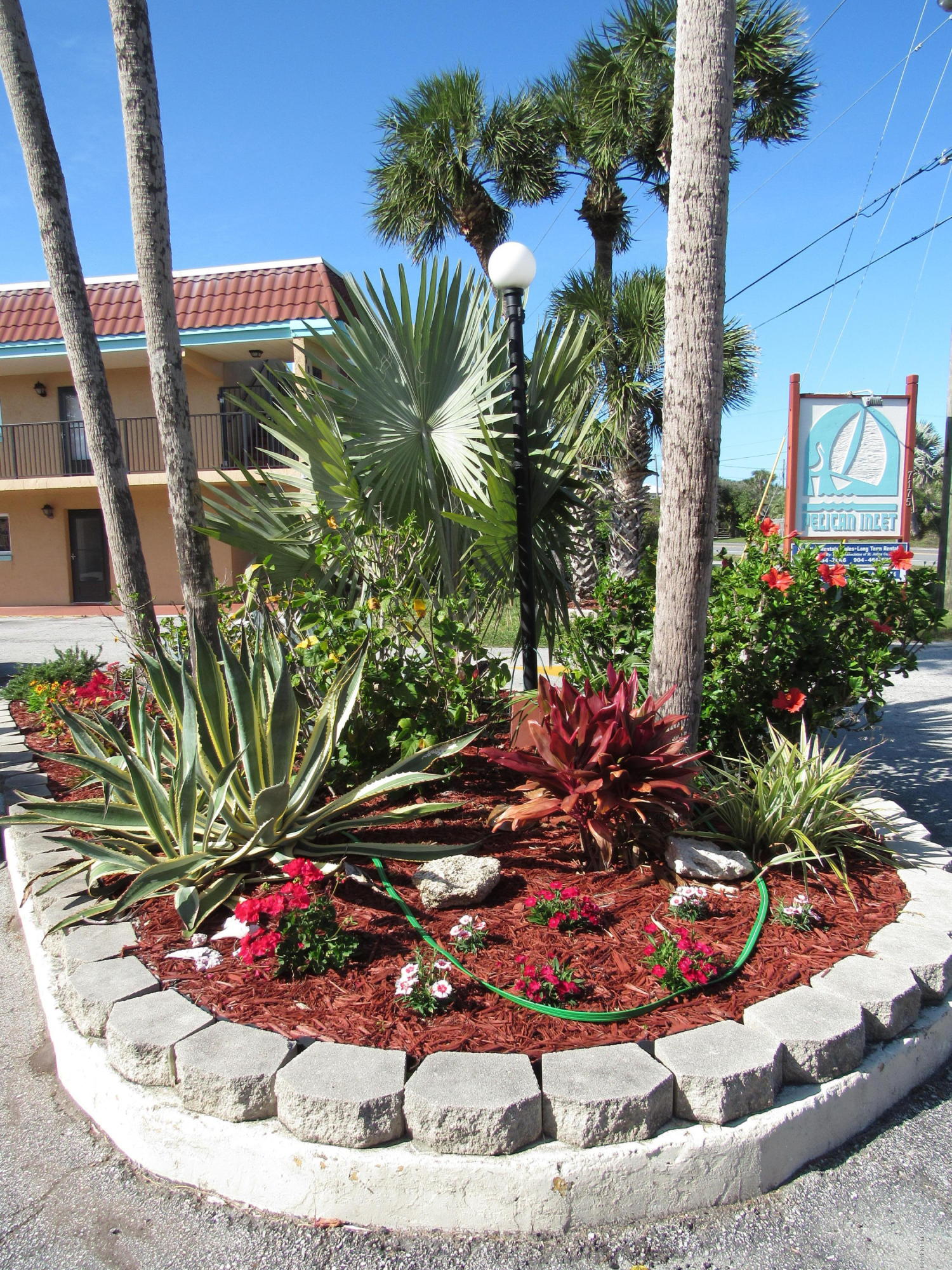 7175 South A1a Street, Unit B212 St. Augustine, FL 32080 - Photo 20 of 29 a view of a potted plants in front of house