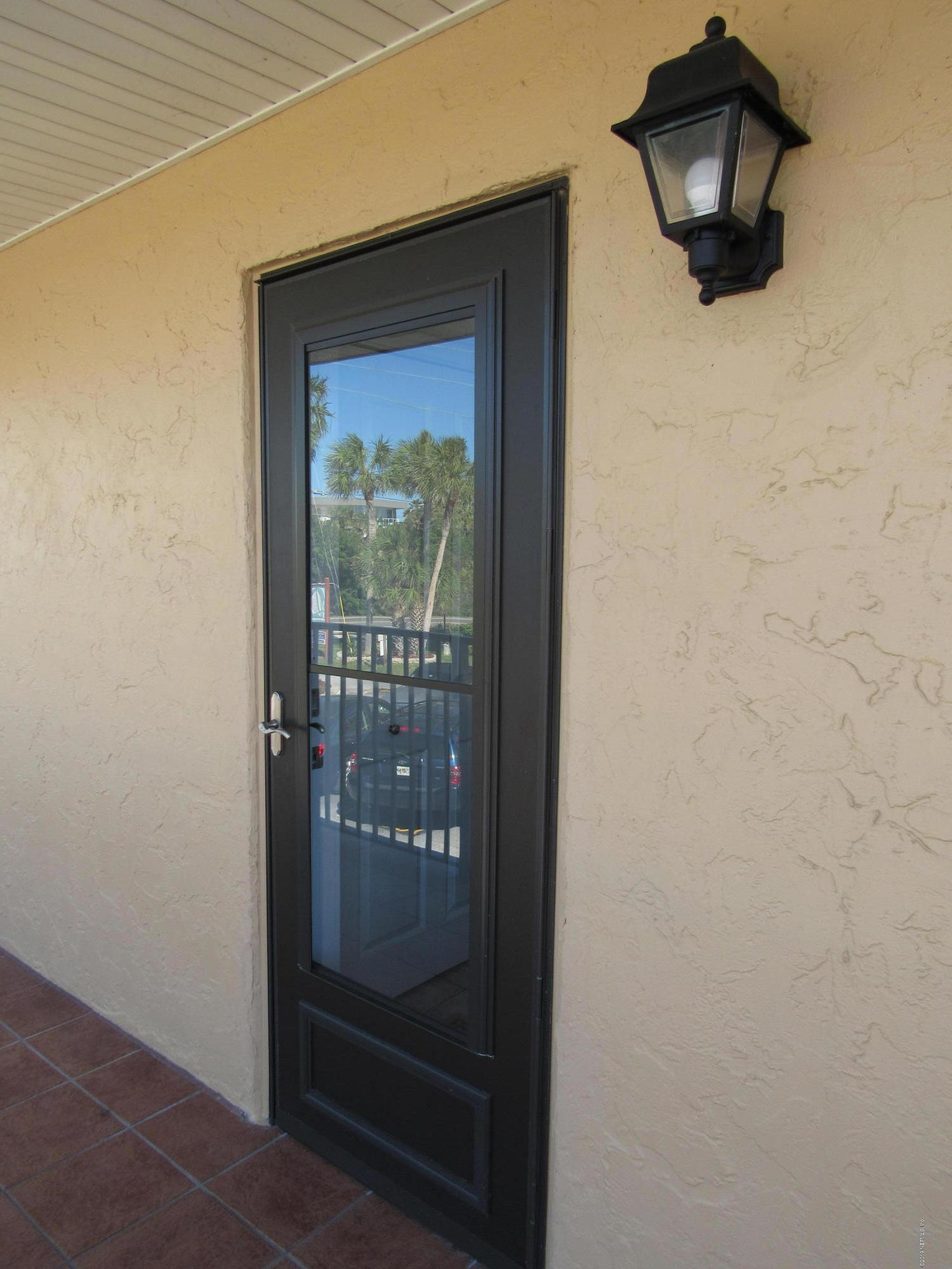 7175 South A1a Street, Unit B212 St. Augustine, FL 32080 - Photo 3 of 29 a view of a door and small space