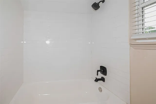 a bathroom with a bathtub