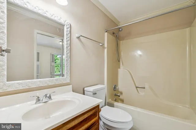 a bathroom with a sink and shower