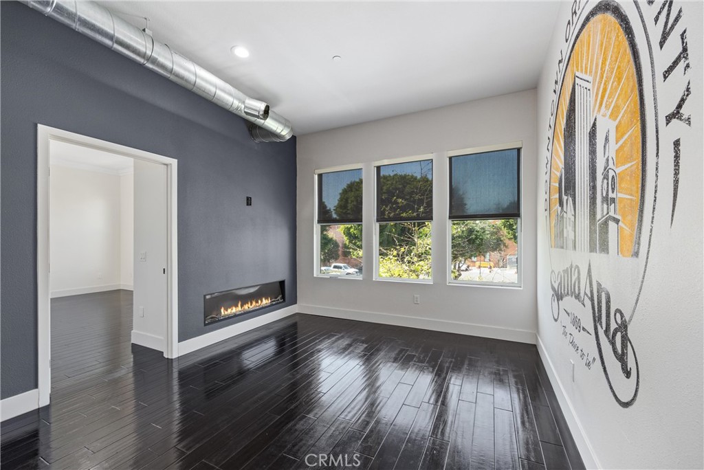 190 West 3rd Street Santa Ana, CA 92701 - Photo 3 of 18 Living room/sitting area has a fireplace