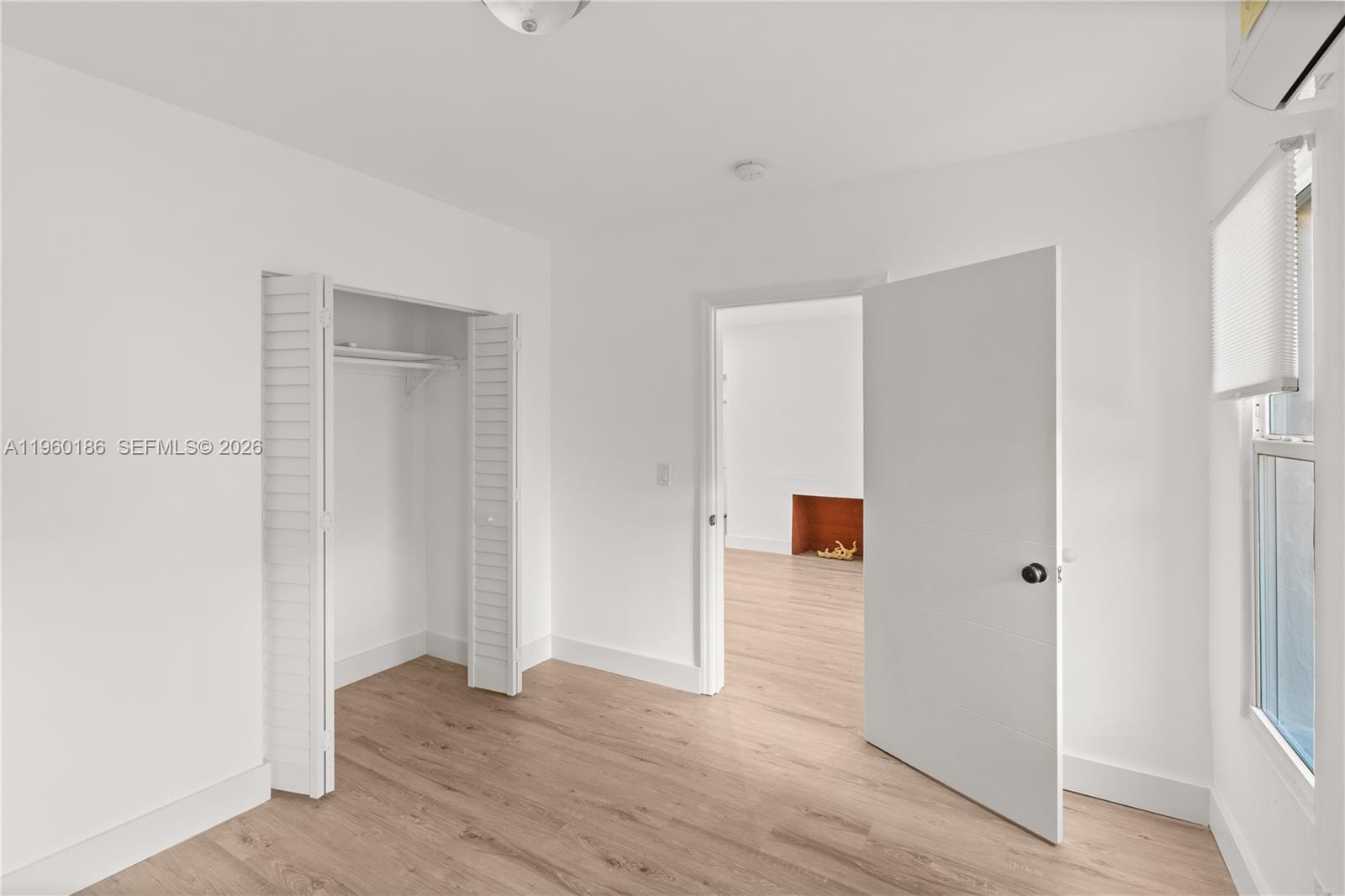 2508 Southwest 10th Street, Unit 2508 Miami, FL 33135 - Photo 13 of 26 a view of a livingroom with wooden floor