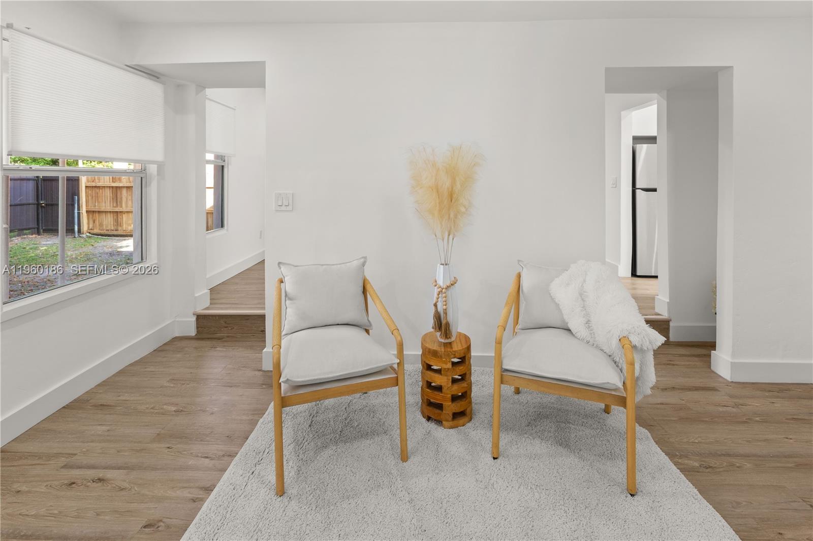 2508 Southwest 10th Street, Unit 2508 Miami, FL 33135 - Photo 26 of 26 a living room with furniture and a large window