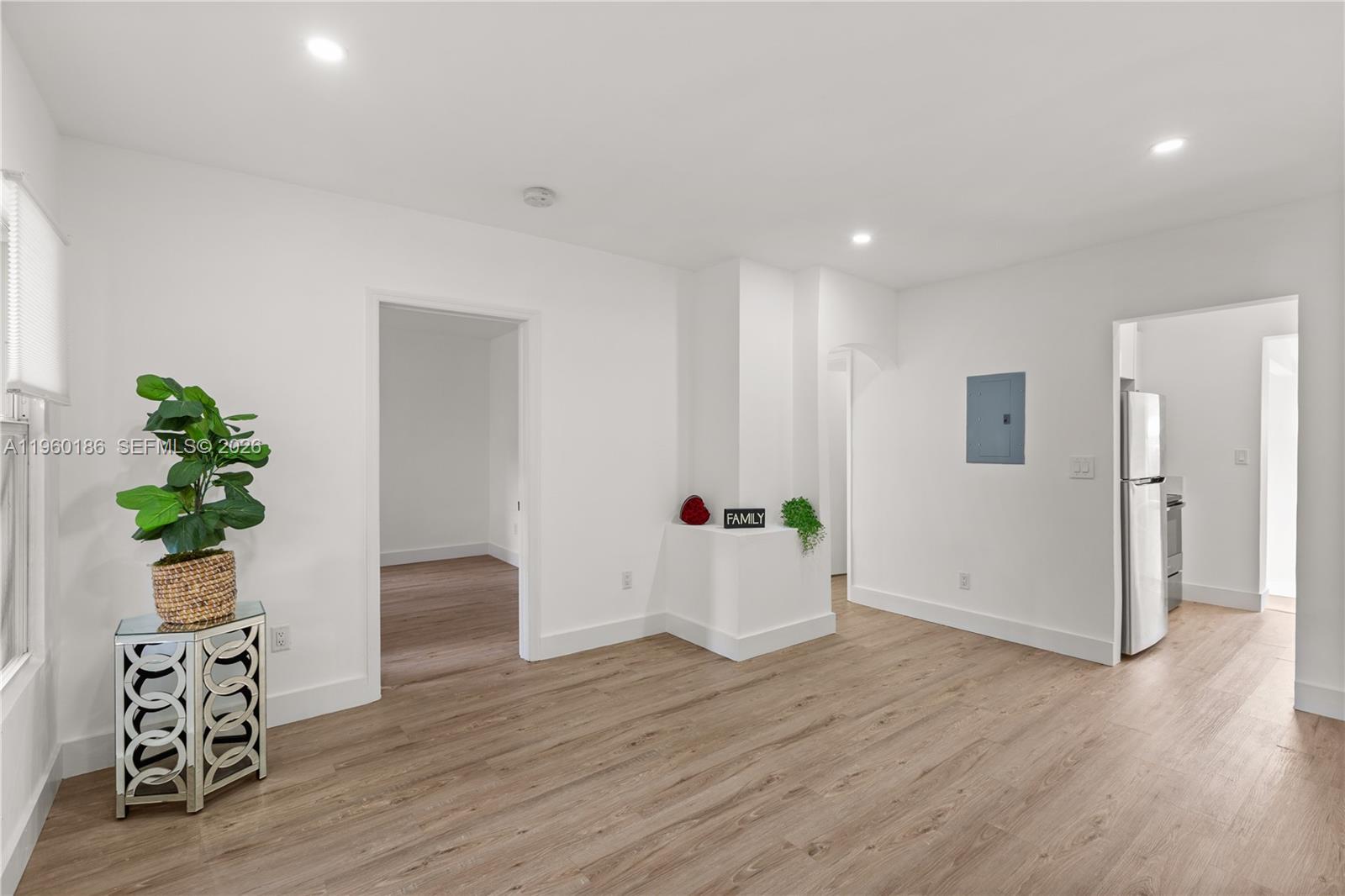 2508 Southwest 10th Street, Unit 2508 Miami, FL 33135 - Photo 10 of 26 a view of an empty room and wooden floor