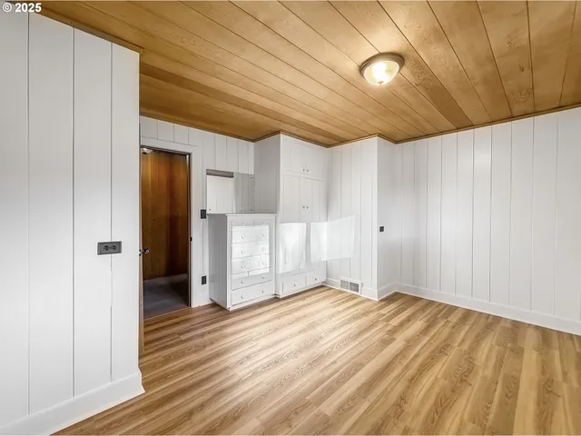 a view of a livingroom with wooden floor