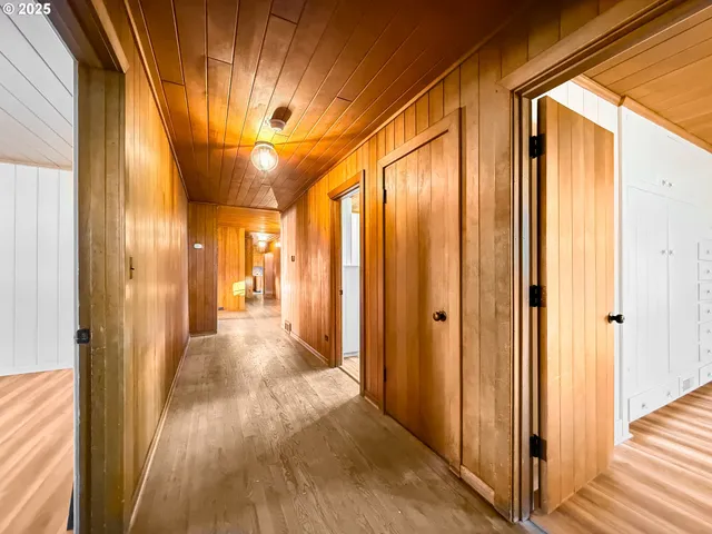 a view of gallery with wooden floor