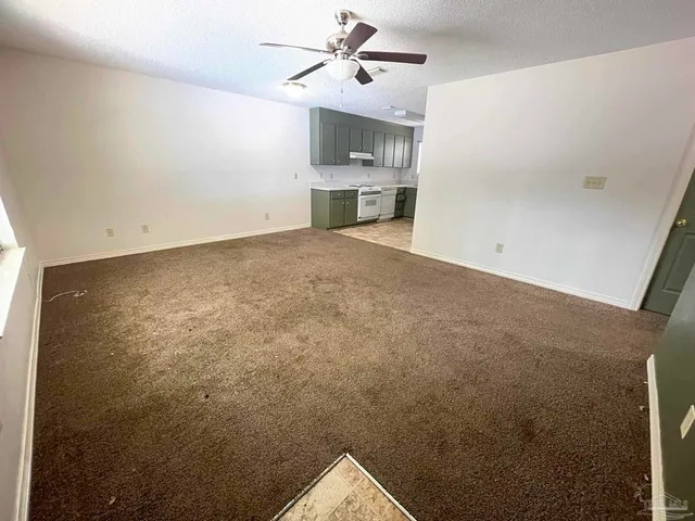 a view of a backyard with a small cabin