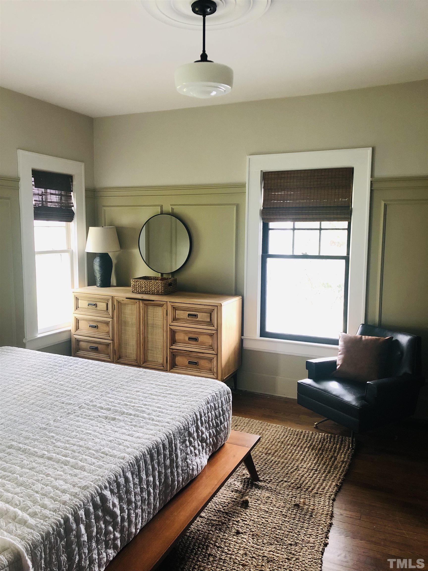 615 Milton Road Durham, NC 27712 - Photo 15 of 36 a bedroom with a bed and window