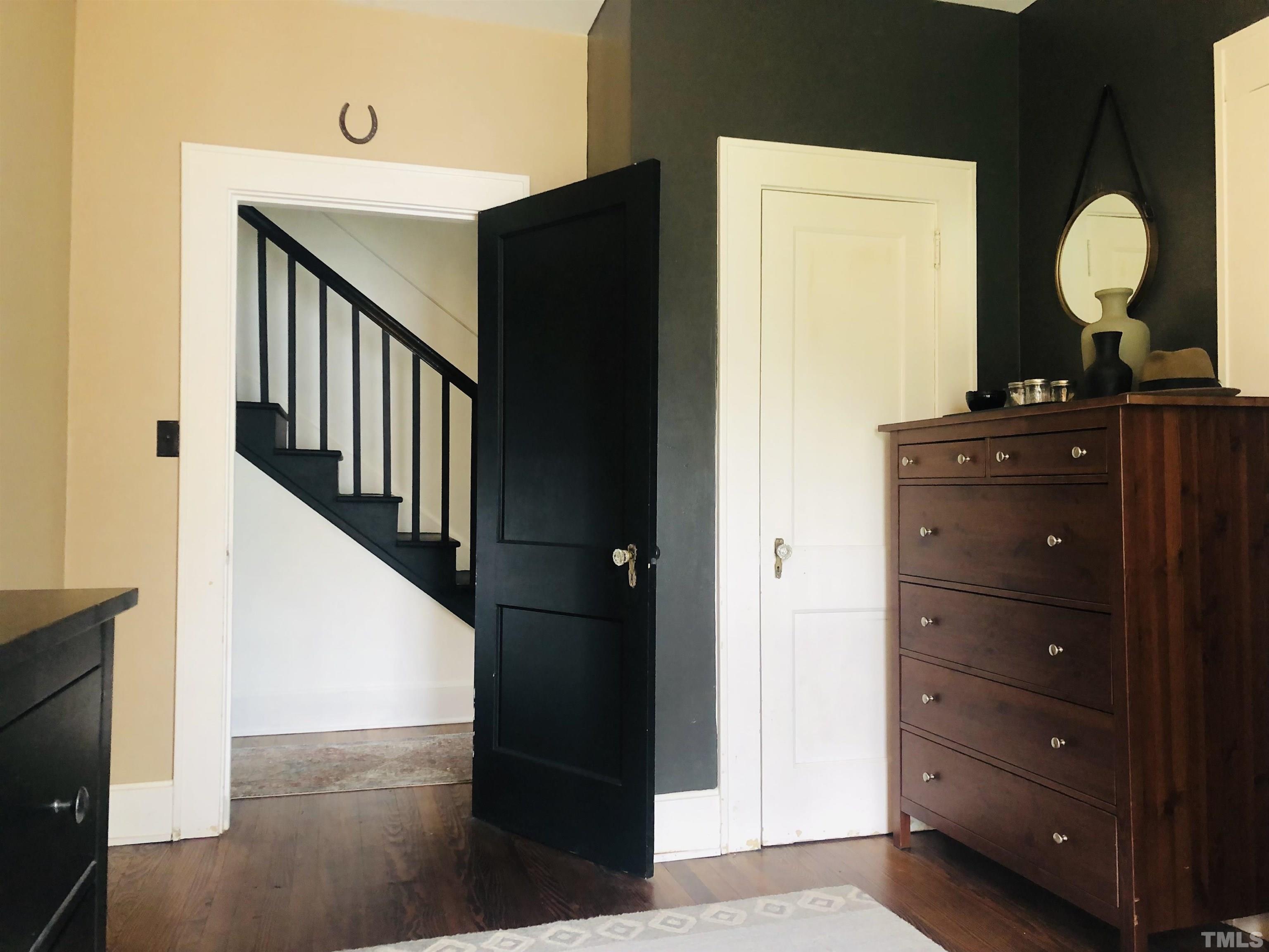 615 Milton Road Durham, NC 27712 - Photo 18 of 36 a view of a hallway with front door windows and entryway