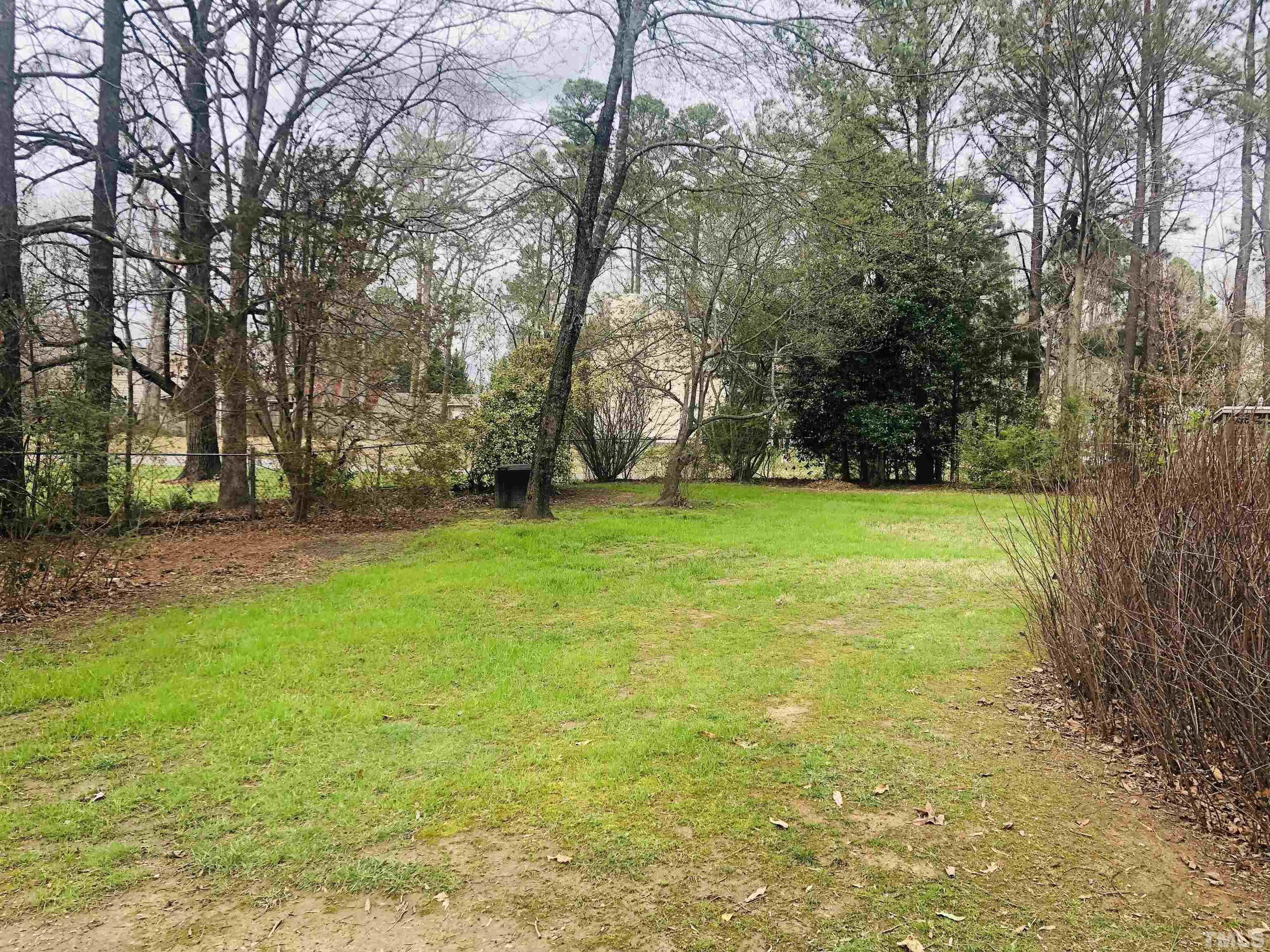 615 Milton Road Durham, NC 27712 - Photo 30 of 36 a view of a field with trees