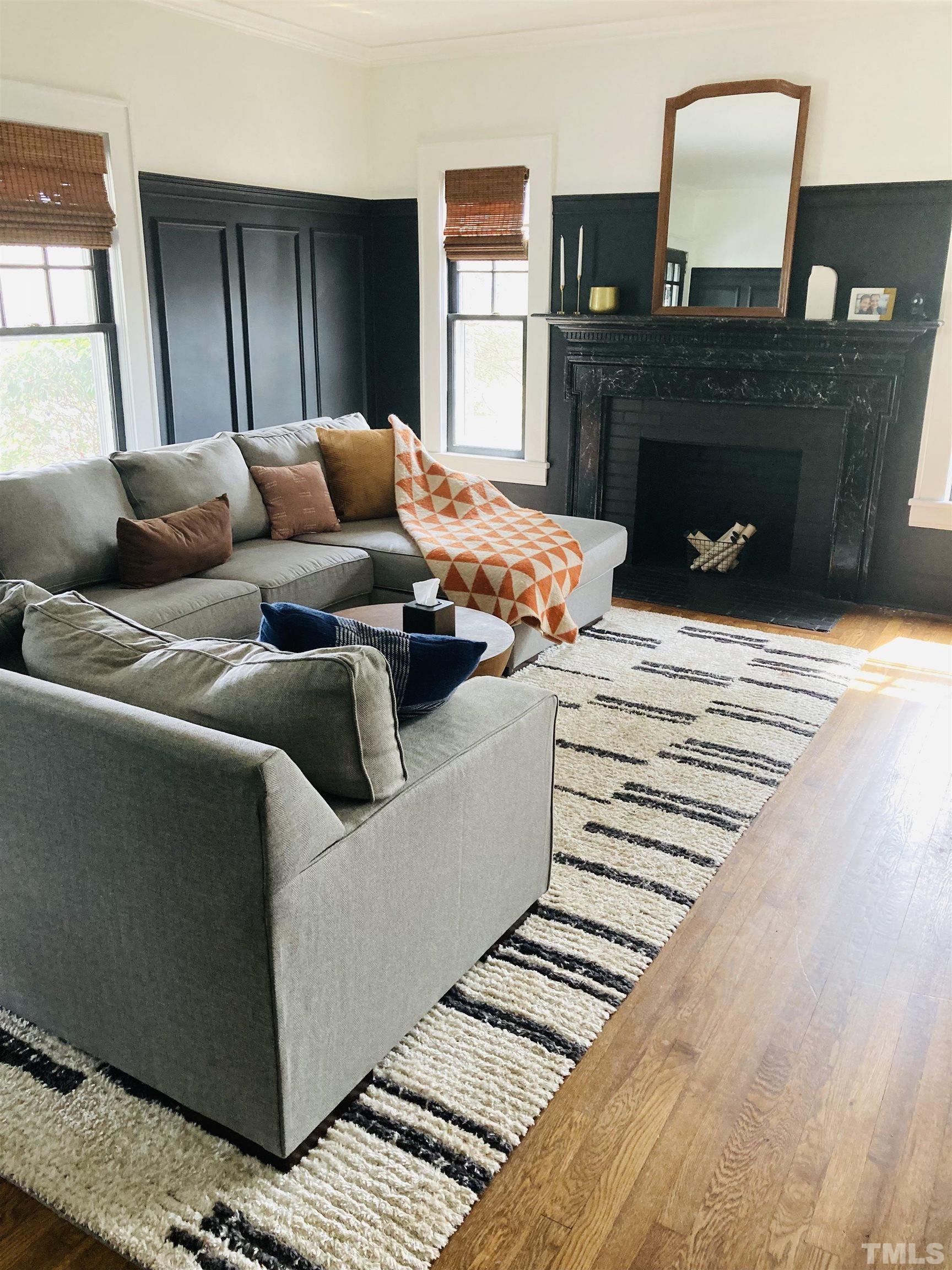 615 Milton Road Durham, NC 27712 - Photo 5 of 36 a living room with furniture and a fireplace