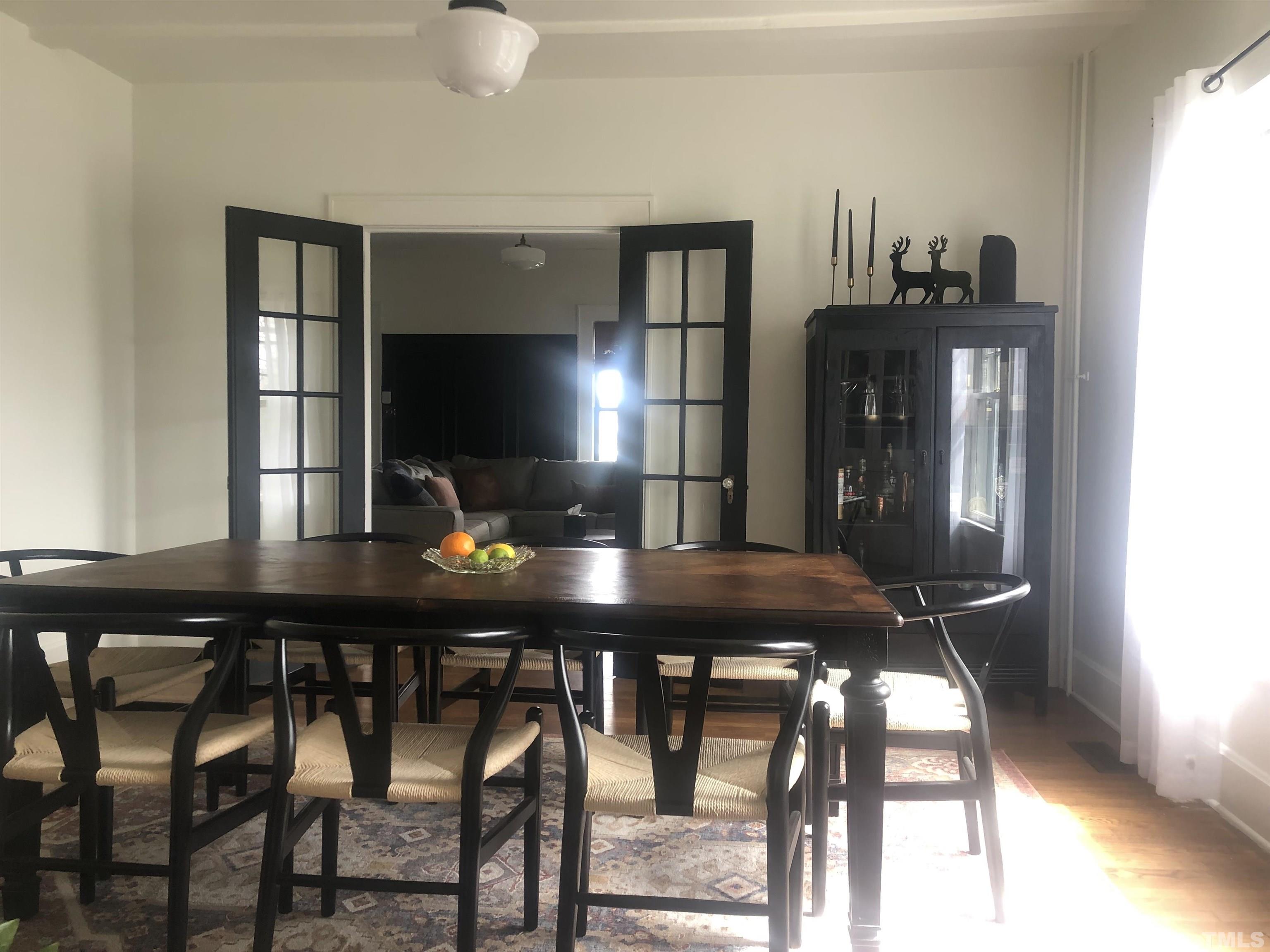 615 Milton Road Durham, NC 27712 - Photo 8 of 36 a view of a dining room with furniture
