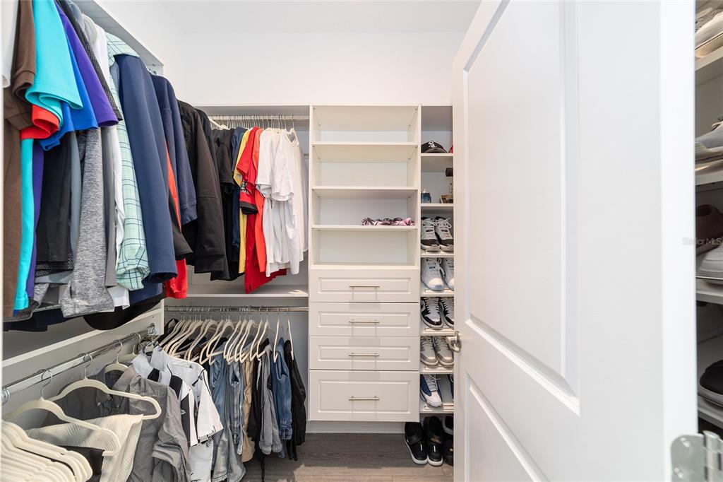 7233 Southwest 64th St Road Ocala, FL 34474 - Photo 20 of 48 a view of walk in closet with clothes