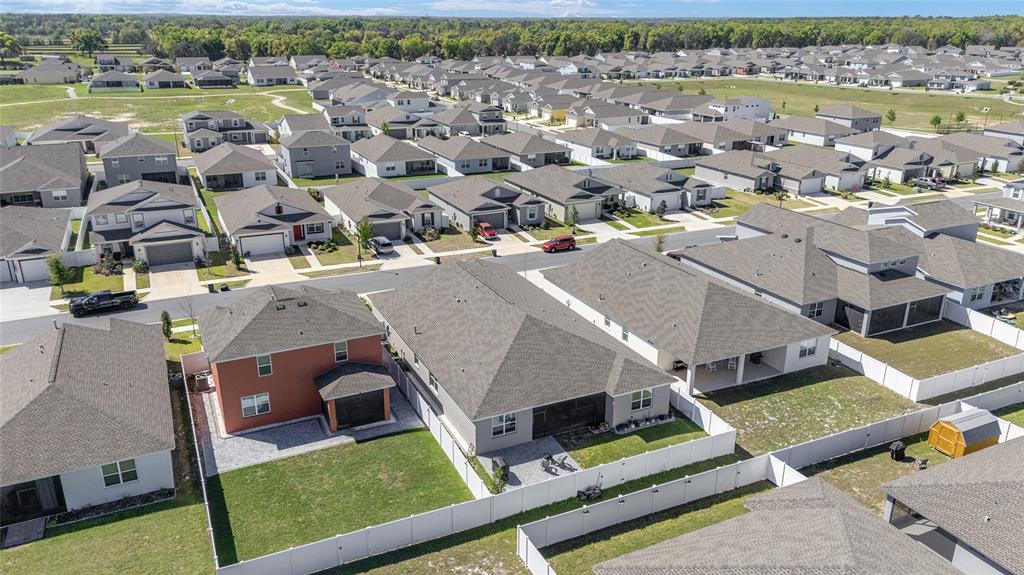 7233 Southwest 64th St Road Ocala, FL 34474 - Photo 47 of 48 an aerial view of residential houses with outdoor space and river