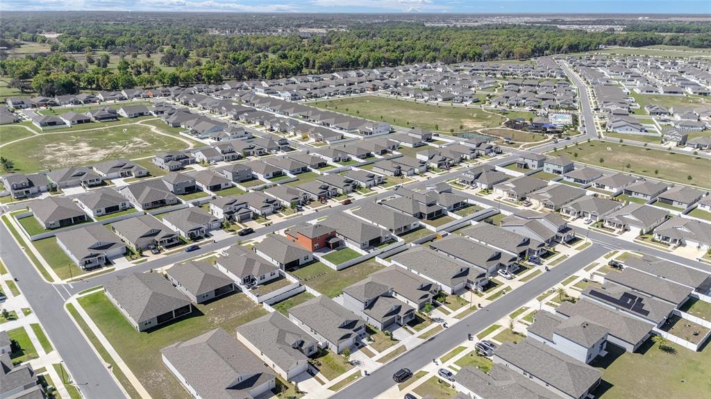7233 Southwest 64th St Road Ocala, FL 34474 - Photo 48 of 48 an aerial view of residential houses with outdoor space