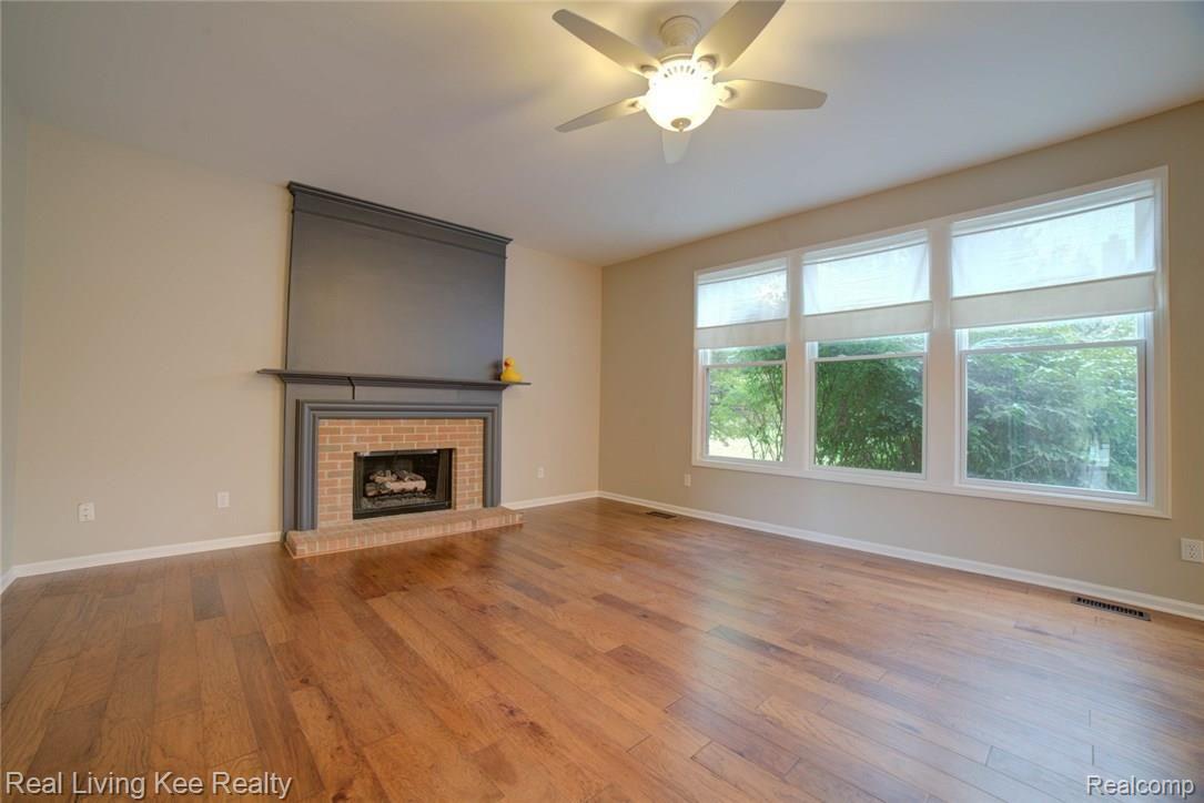 1788 Ring Neck Drive Rochester, MI 48307 - Photo 10 of 24 great room with gas fireplace