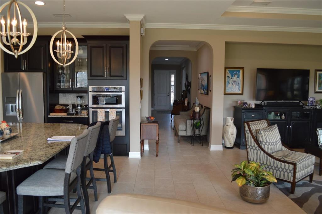 32026 Wenlock Loop Wesley Chapel, FL 33543 - Photo 18 of 52 a view of a dining room with furniture