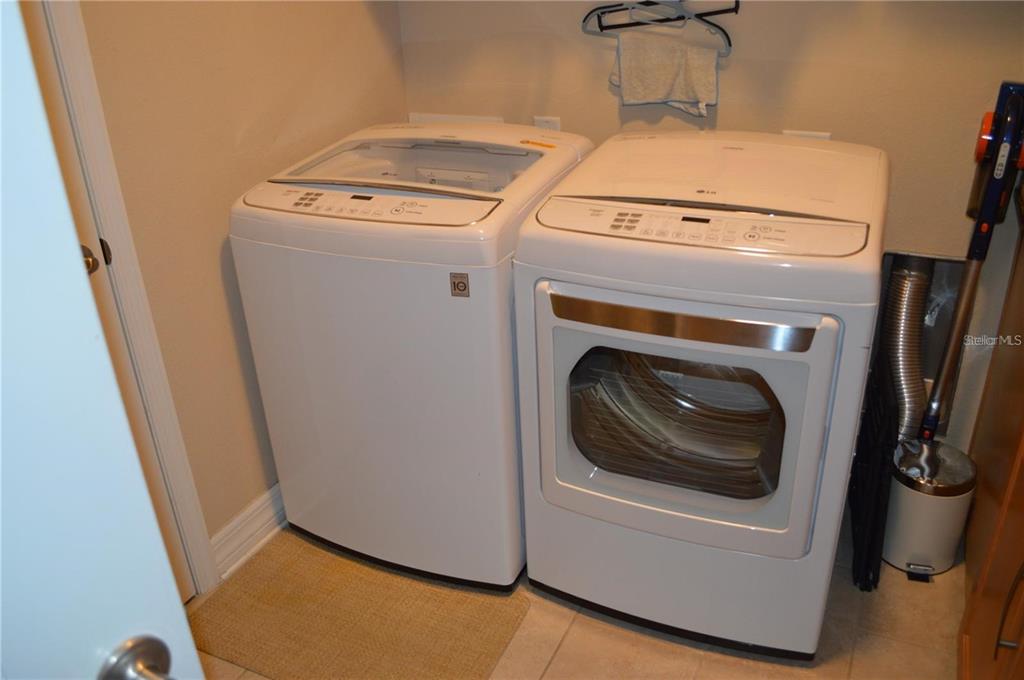 32026 Wenlock Loop Wesley Chapel, FL 33543 - Photo 45 of 52 a utility room with dryer and washer