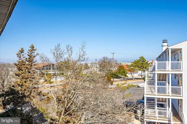 a view of building with mountain view
