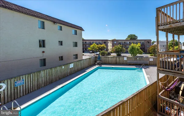 a view of a backyard and patio