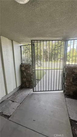 a view of a swimming pool with outdoor seating and yard
