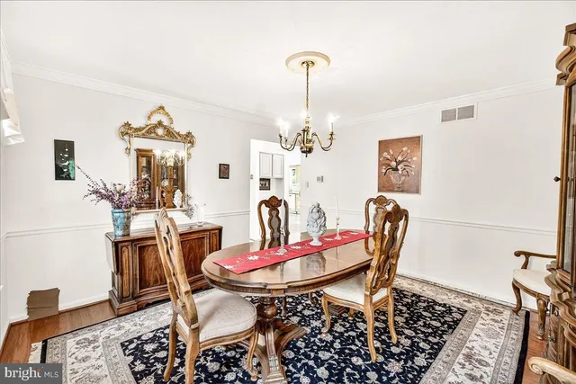 a spacious bedroom with a bed and a window