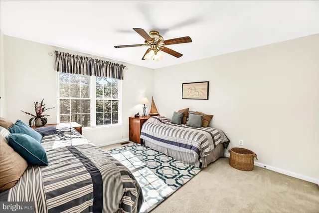 a view of balcony with wooden floor and fence