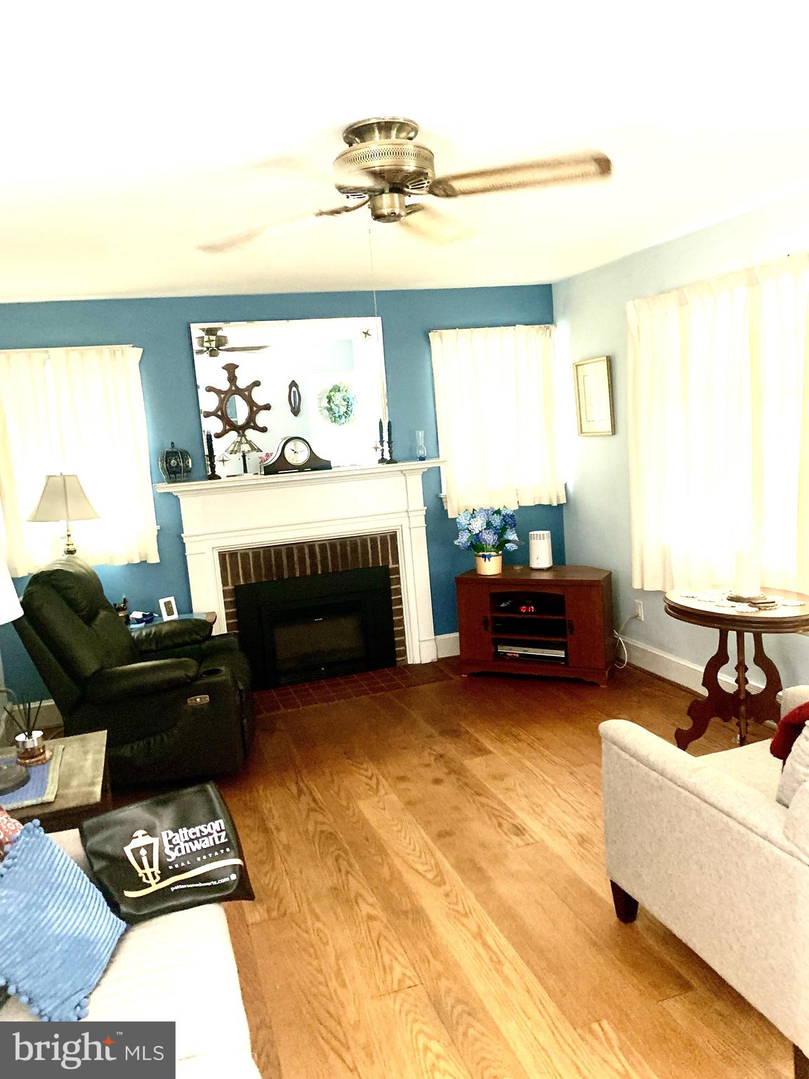 832 Evanson Road Hockessin, DE 19707 - Photo 7 of 13 a living room with furniture and a fireplace