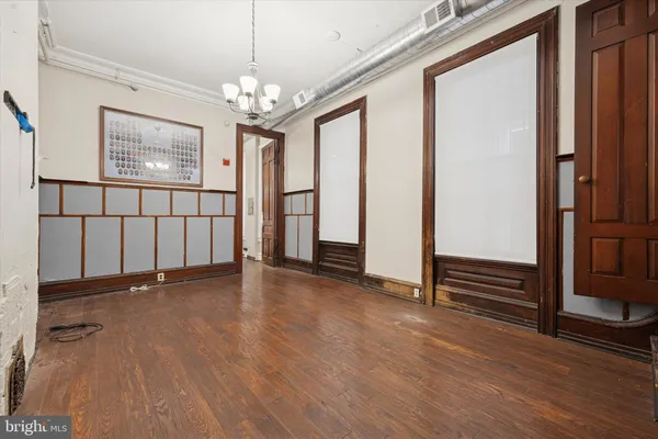 a view of entryway with wooden floor