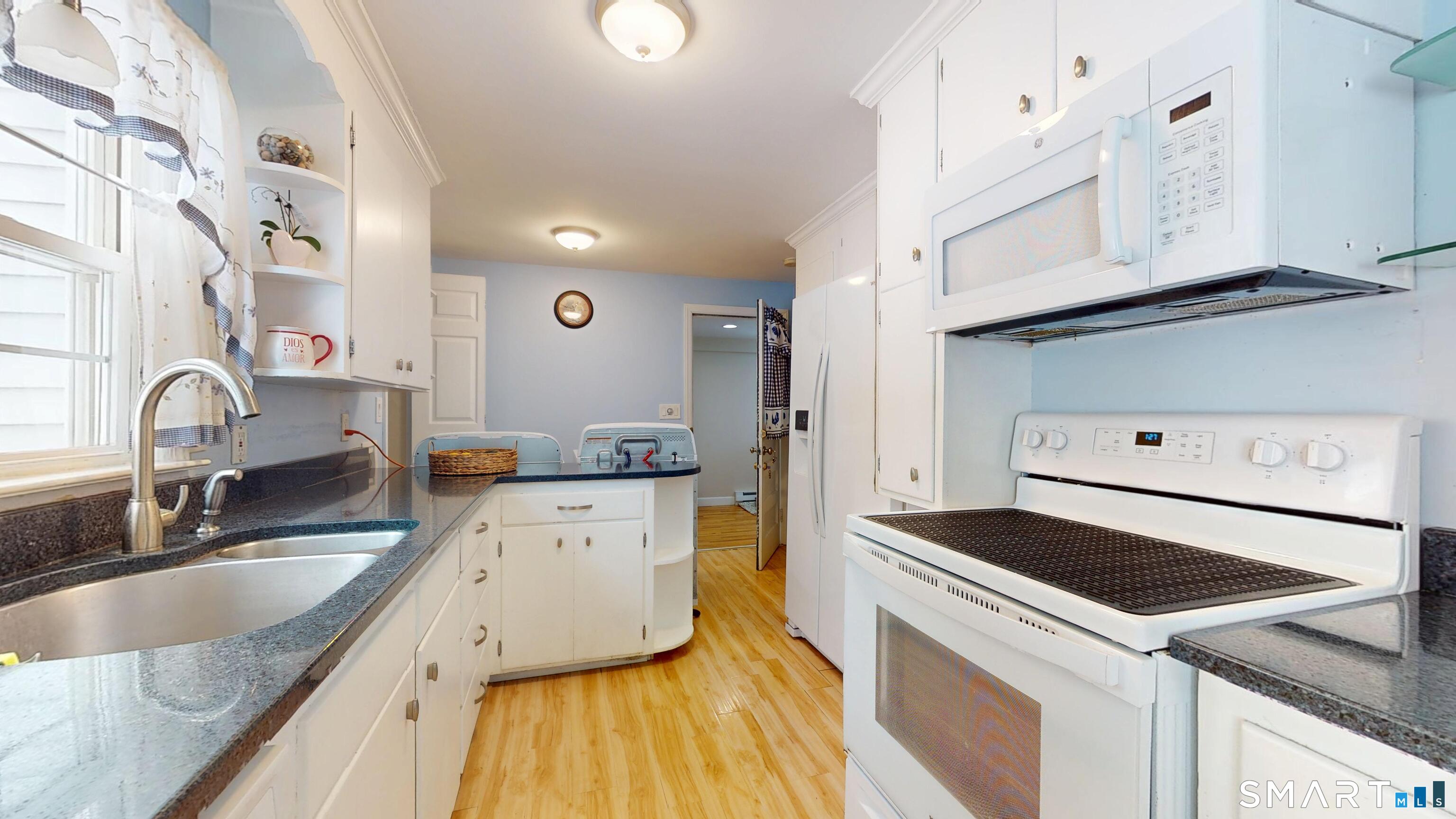 33 Olney Road Wethersfield, CT 06109 - Photo 11 of 27 Convenient washer and dryer hookups located in the kitchen