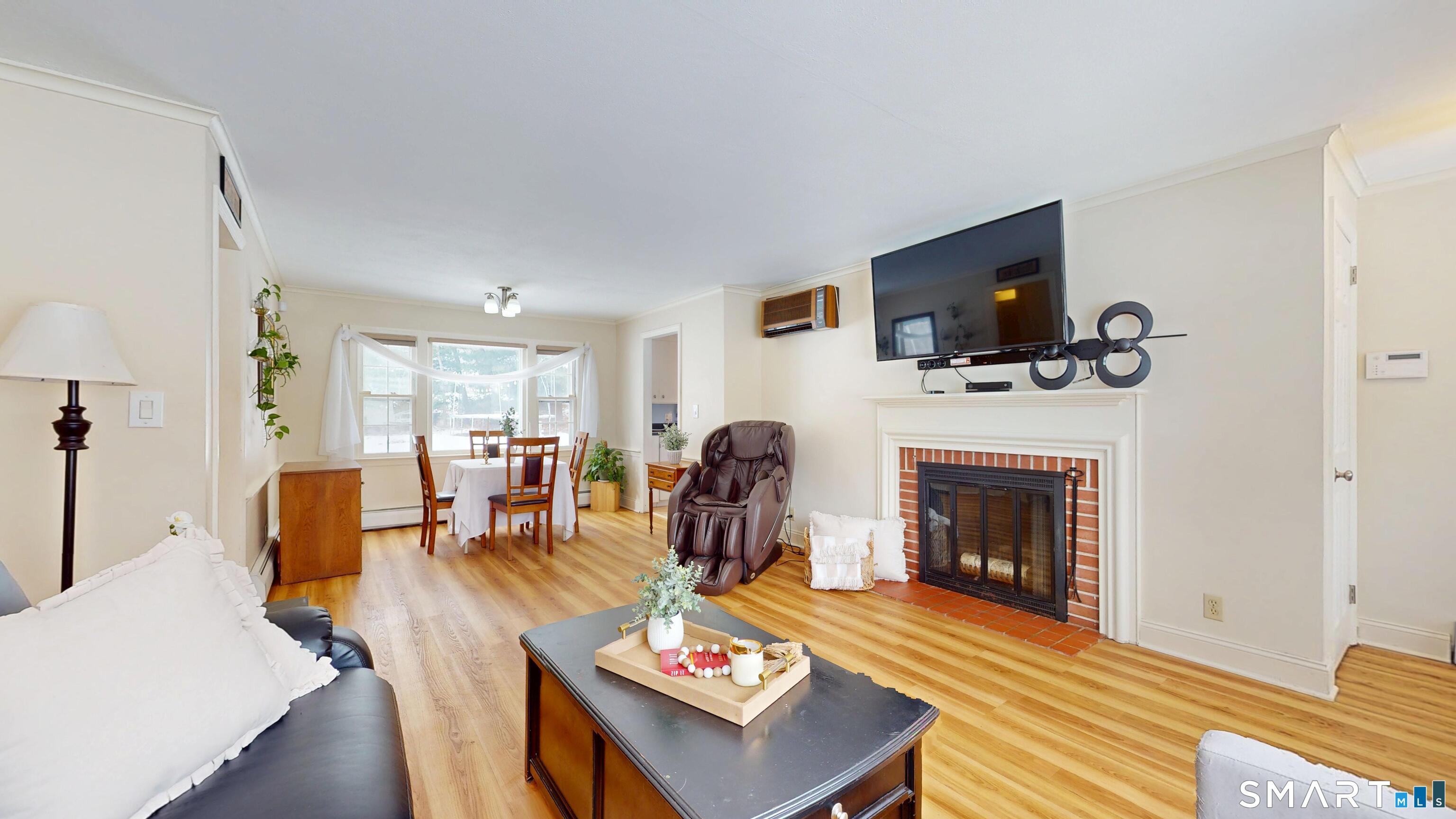 33 Olney Road Wethersfield, CT 06109 - Photo 6 of 27 Cozy fireplace perfect for relaxing evenings