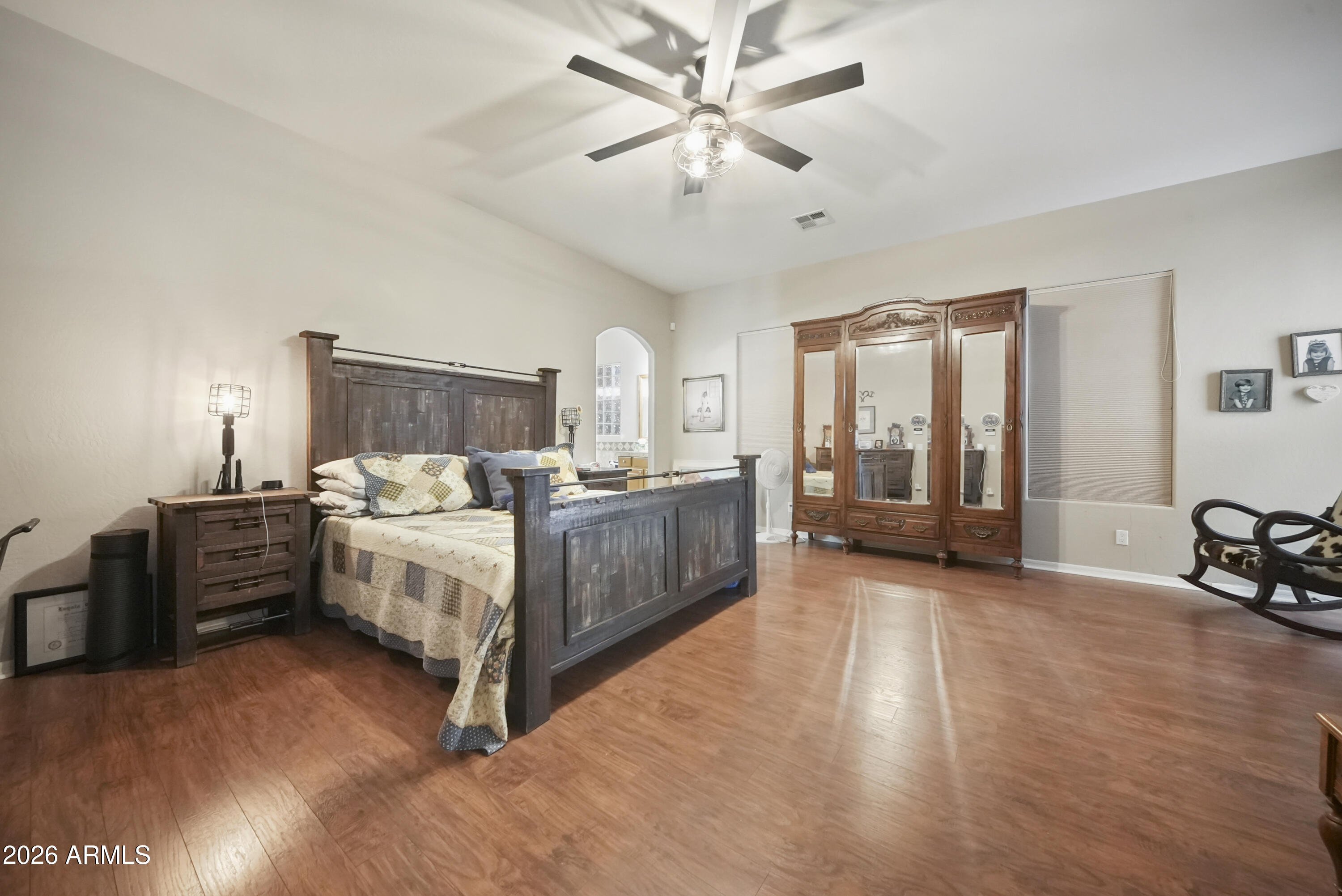 605 West Ridgecrest Road Phoenix, AZ 85086 - Photo 24 of 40 a bedroom with a bed dresser and a large window