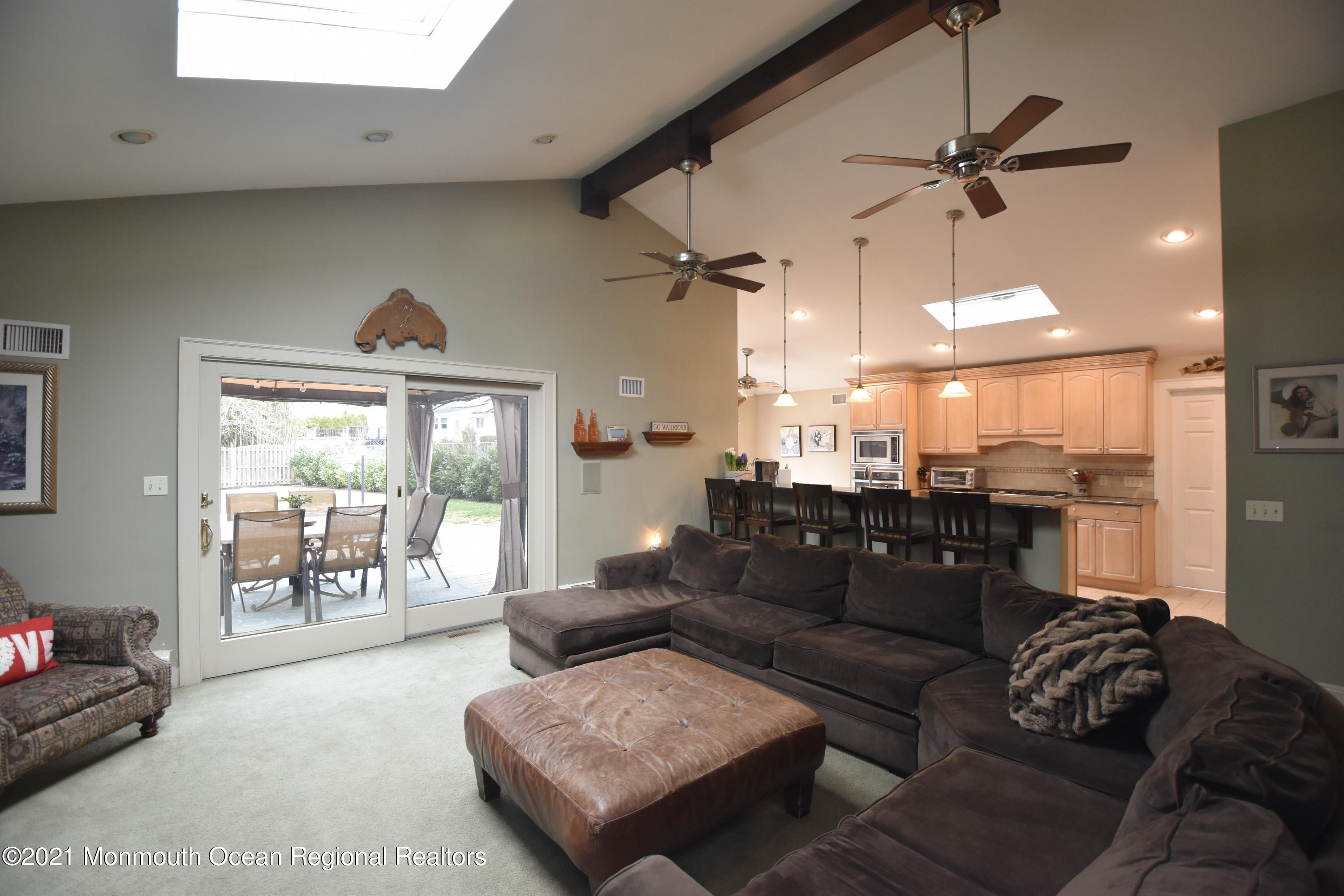 1007 Cedar Lane Brielle, NJ 08730 - Photo 12 of 46 a living room with furniture and a large window