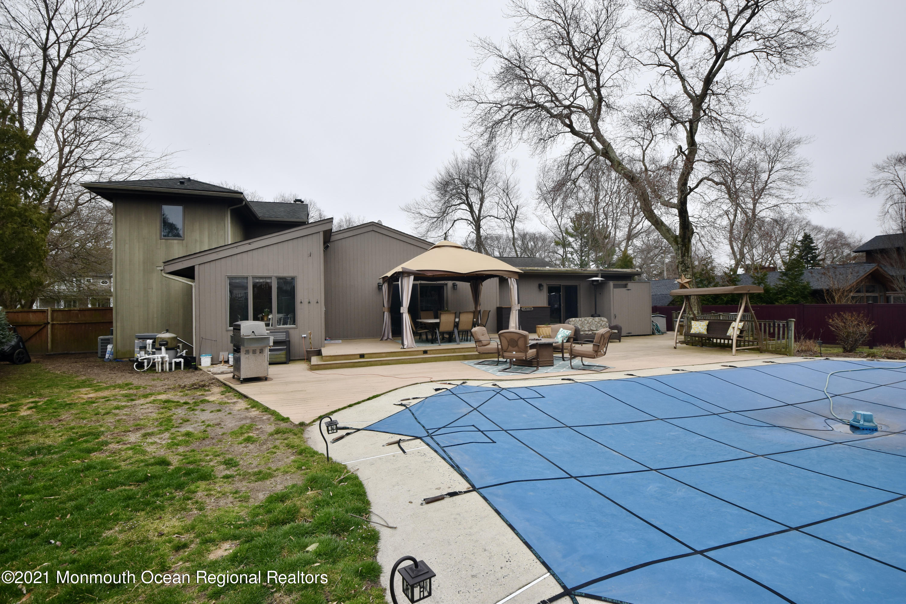 1007 Cedar Lane Brielle, NJ 08730 - Photo 3 of 46 a view of a house with backyard and sitting area