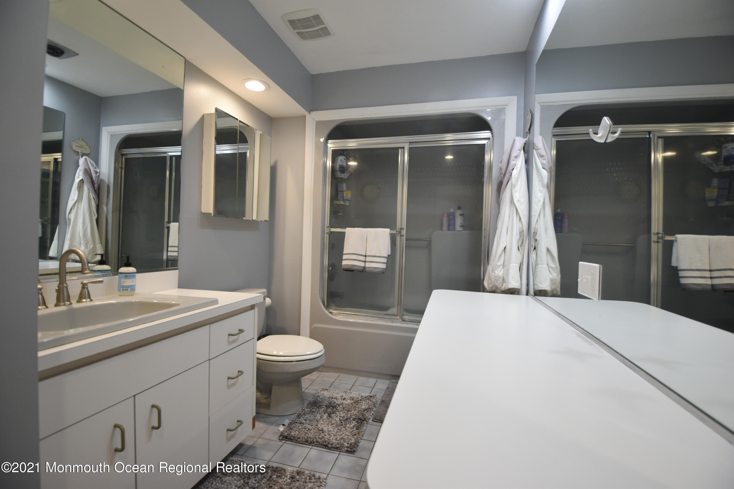 1007 Cedar Lane Brielle, NJ 08730 - Photo 26 of 46 a bathroom with a sink toilet and shower