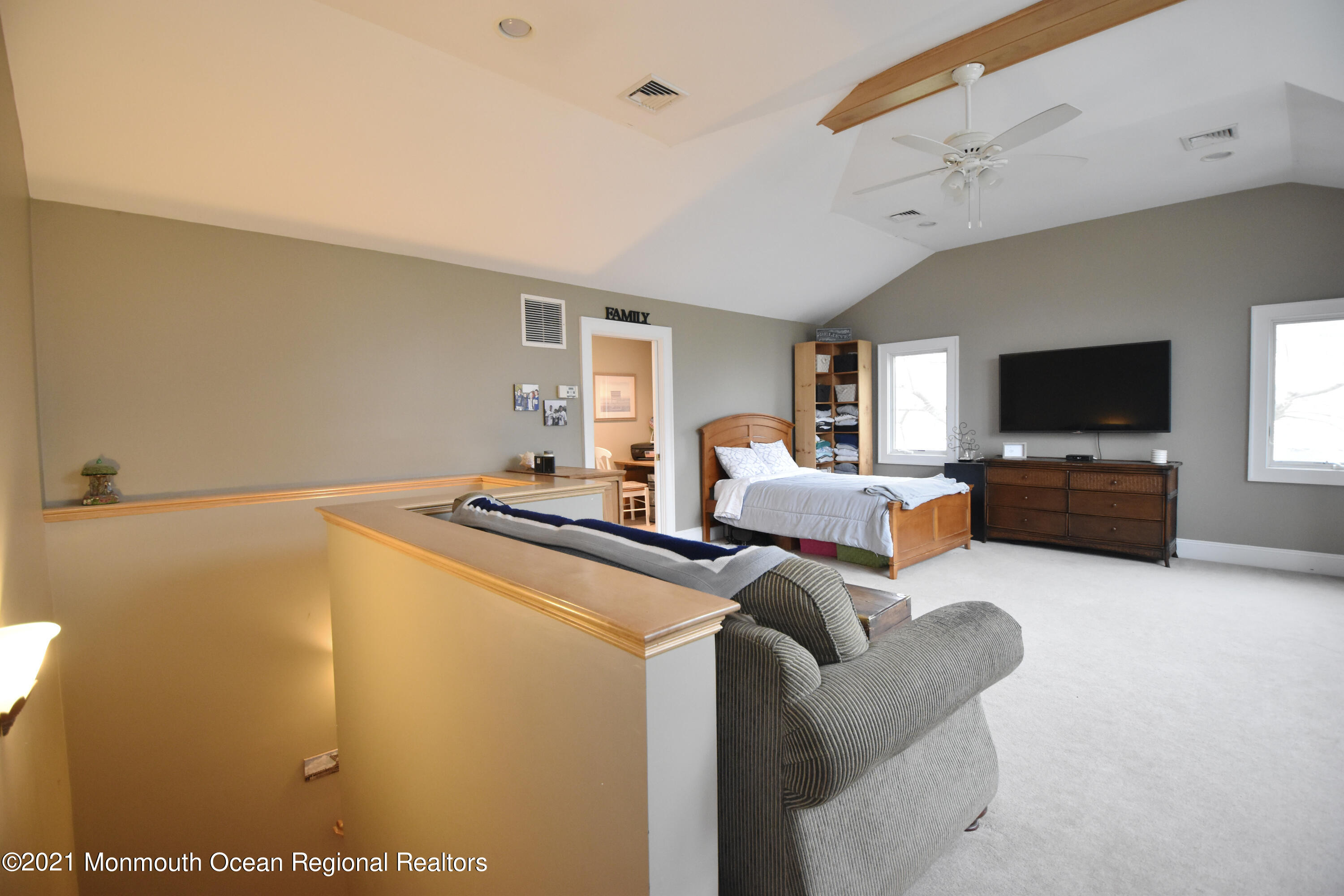 1007 Cedar Lane Brielle, NJ 08730 - Photo 31 of 46 a living room with furniture and a flat screen tv