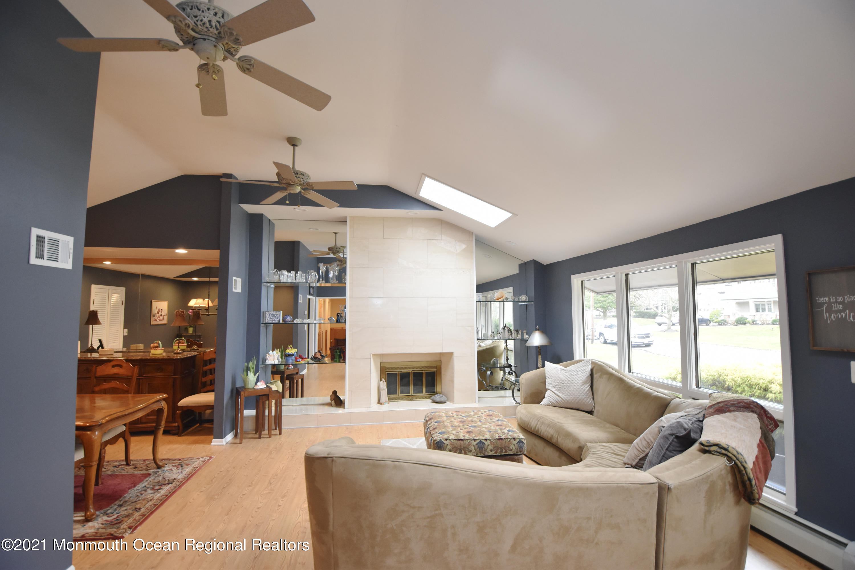 1007 Cedar Lane Brielle, NJ 08730 - Photo 5 of 46 a living room with furniture and a fireplace