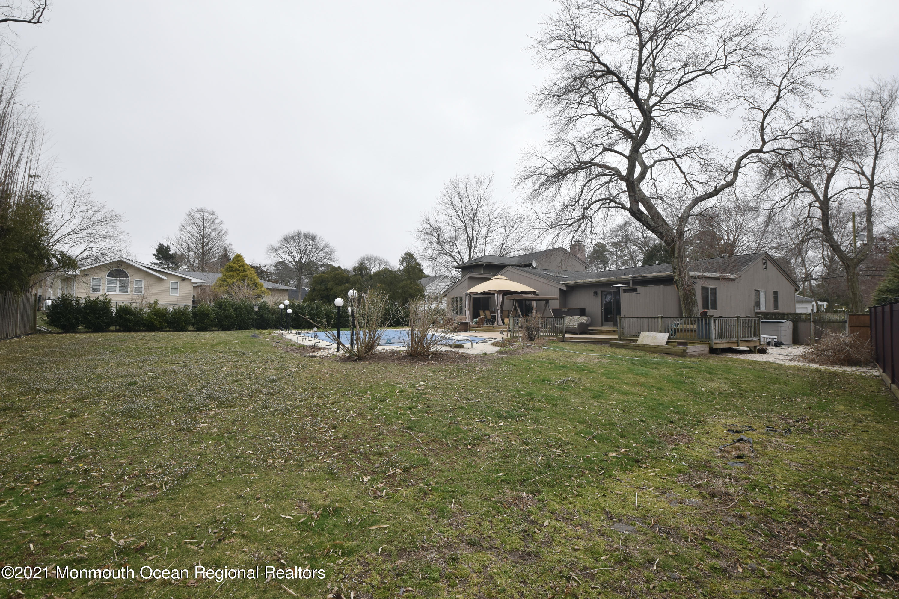 1007 Cedar Lane Brielle, NJ 08730 - Photo 44 of 46 a front view of a house with garden
