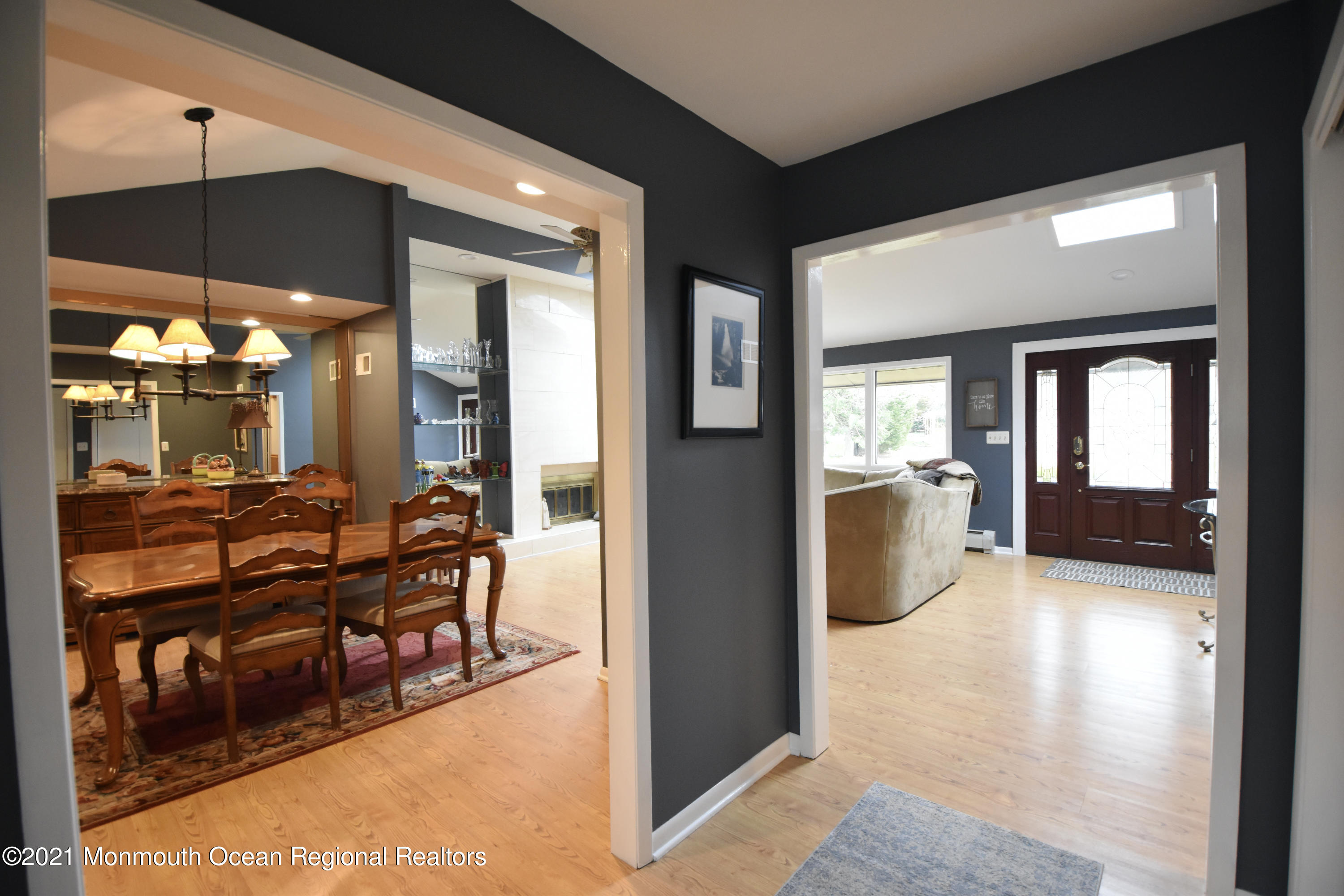 1007 Cedar Lane Brielle, NJ 08730 - Photo 8 of 46 a view of a livingroom with furniture and a dinning table