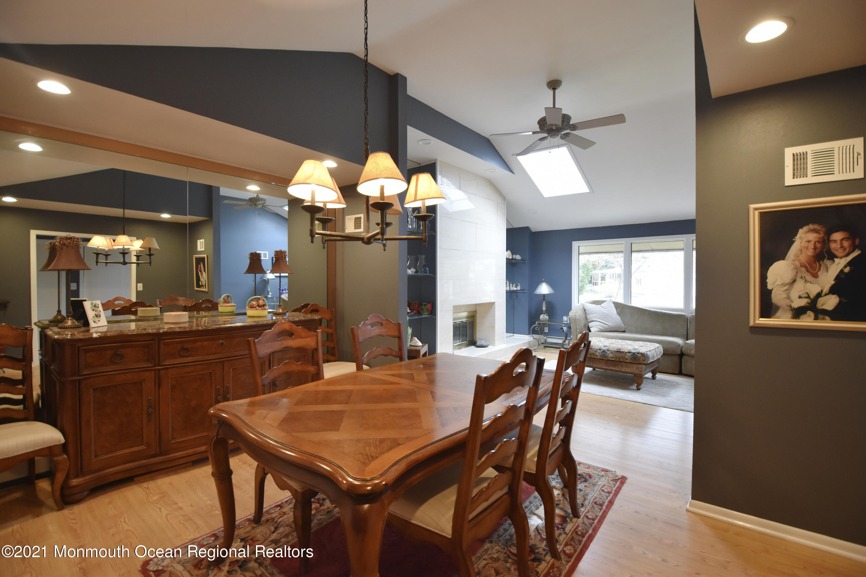 1007 Cedar Lane Brielle, NJ 08730 - Photo 9 of 46 a dining room with a table or chairs and a wooden floor
