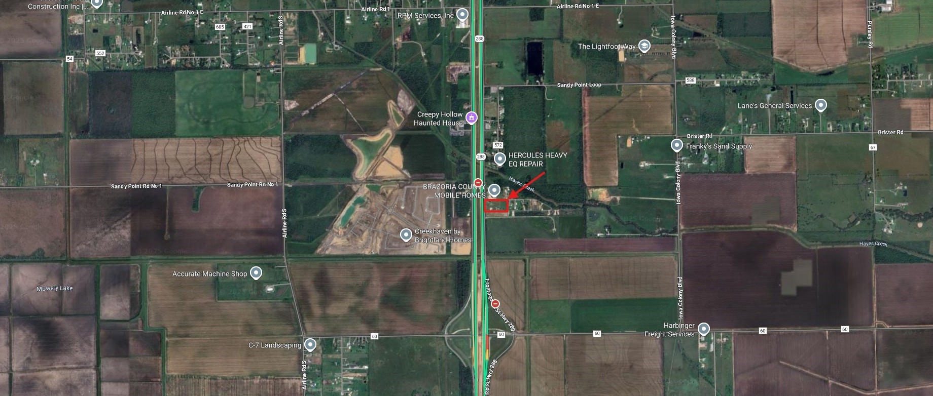 13355-13405 Pleasant Valley Drive Rosharon, TX 77583 - Photo 17 of 18 an aerial view of a house with a yard and a fountain