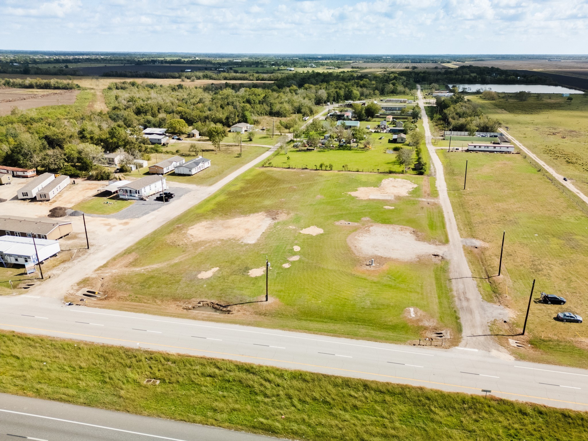 13355-13405 Pleasant Valley Drive Rosharon, TX 77583 - Photo 8 of 18 a view of a swimming pool with an ocean view