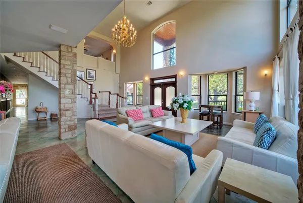 a kitchen with stainless steel appliances a sink stove and refrigerator