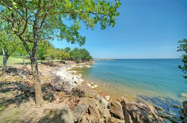 a view of a lake with an outdoor space