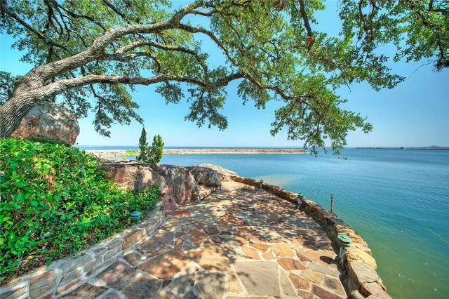 a house with trees in the background