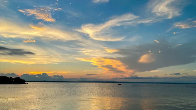 a view of a lake next to a building