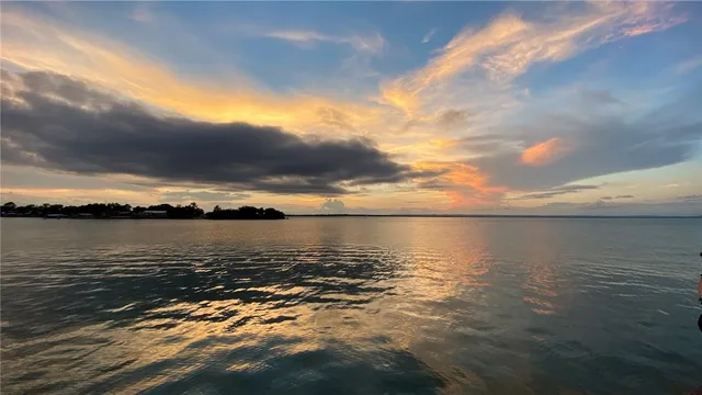 a view of a lake and mountain in the back