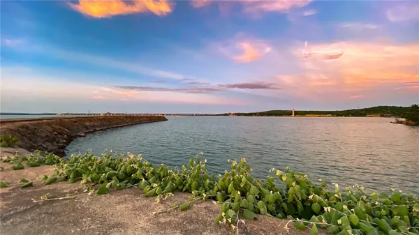 a view of a lake next to a building