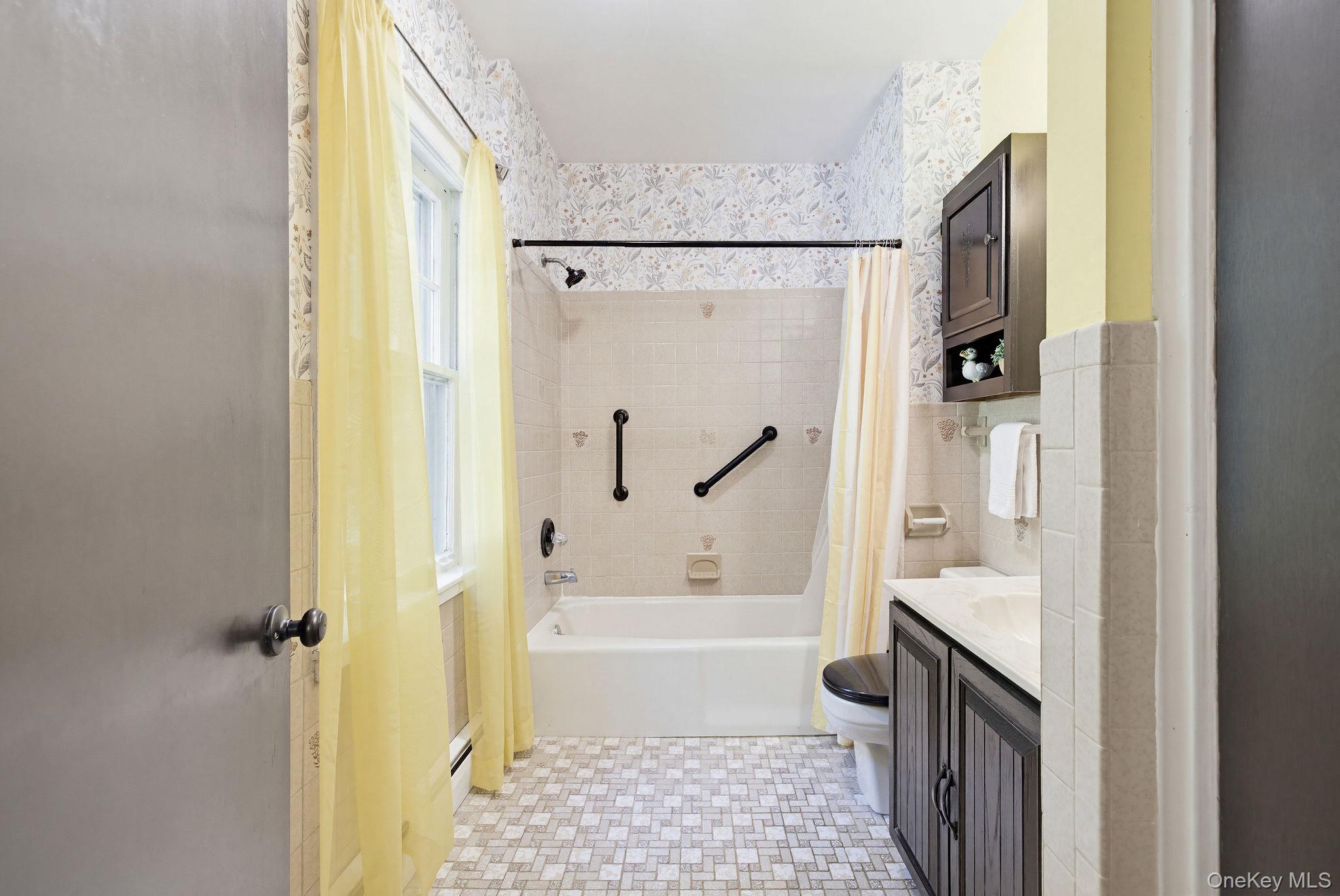 12 Bradhurst Road Carmel, NY 10512 - Photo 15 of 28 a bathroom with a bathtub and a shower