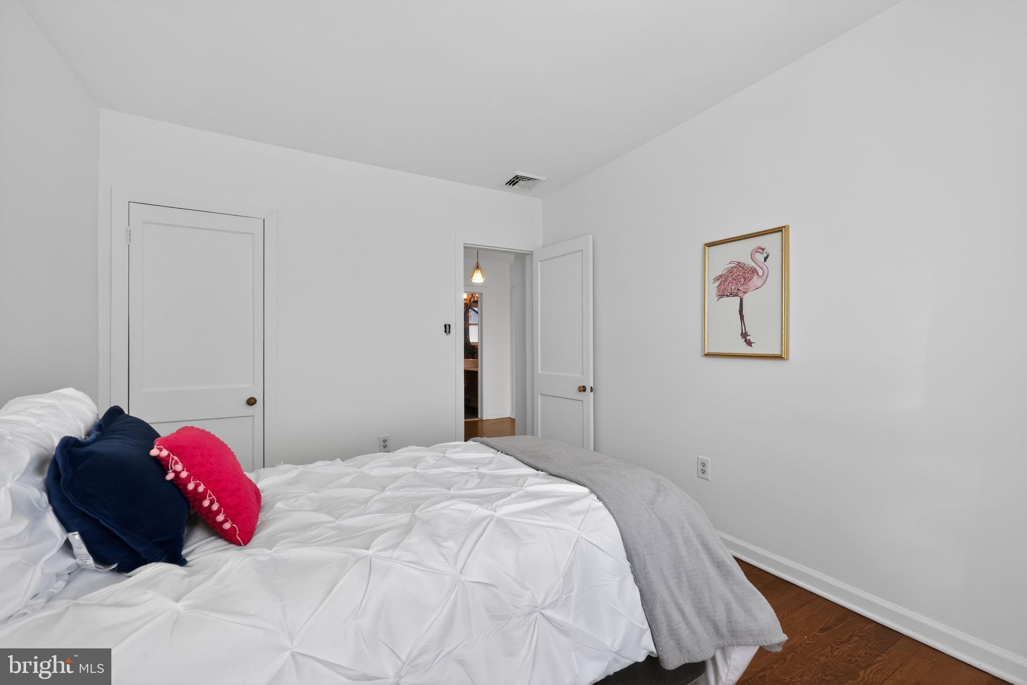 711 Brookhaven Road Wallingford, PA 19086 - Photo 22 of 35 a bedroom with a bed and a window